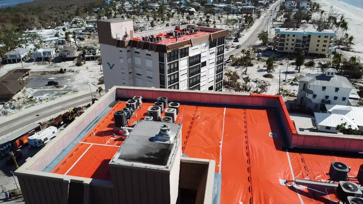 Storm damage cleanup on coastal building